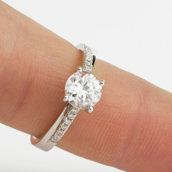 Promise style ring on finger