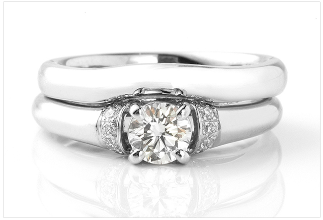 Slightly shaped wedding rings - Photograph with R1D024S Slightly shaped wedding rings created with a gentle curvature to compliment the setting of an engagement ring and the engagement ring width and style.