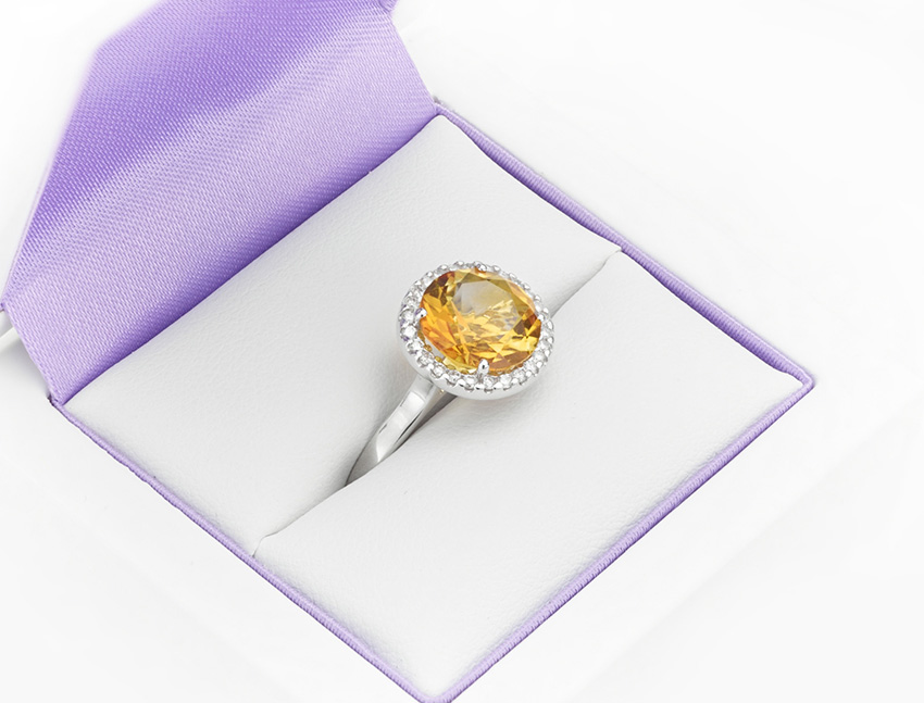 Citrine and diamond halo engagement ring in box