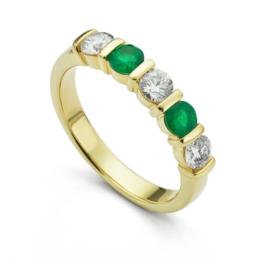 bespoke emerald set wedding ring 