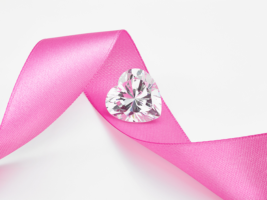 Heart cut diamond on pink ribbon