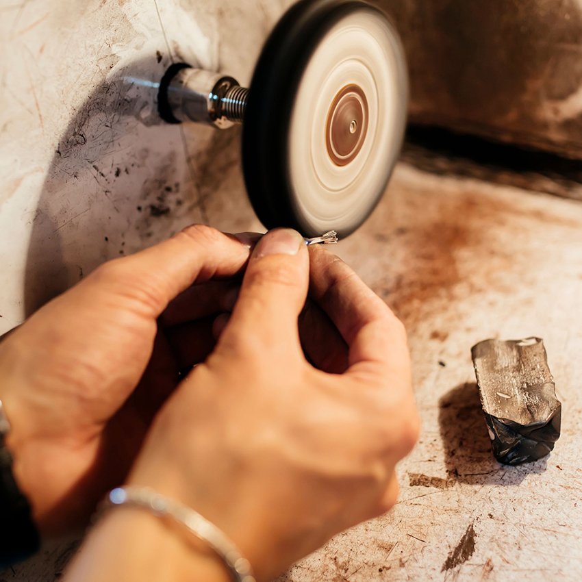 Jewellery ring finishing with a final polish to the engagement ring