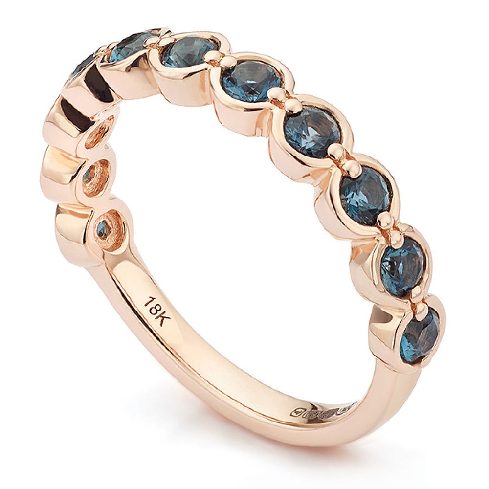 18ct Rose Gold and Blue Topaz Half Eternity Ring 18ct Rose Gold and Blue Topaz Half Eternity Ring