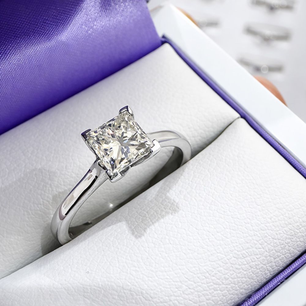 May 1-carat natural princess cut diamond solitaire ring in box