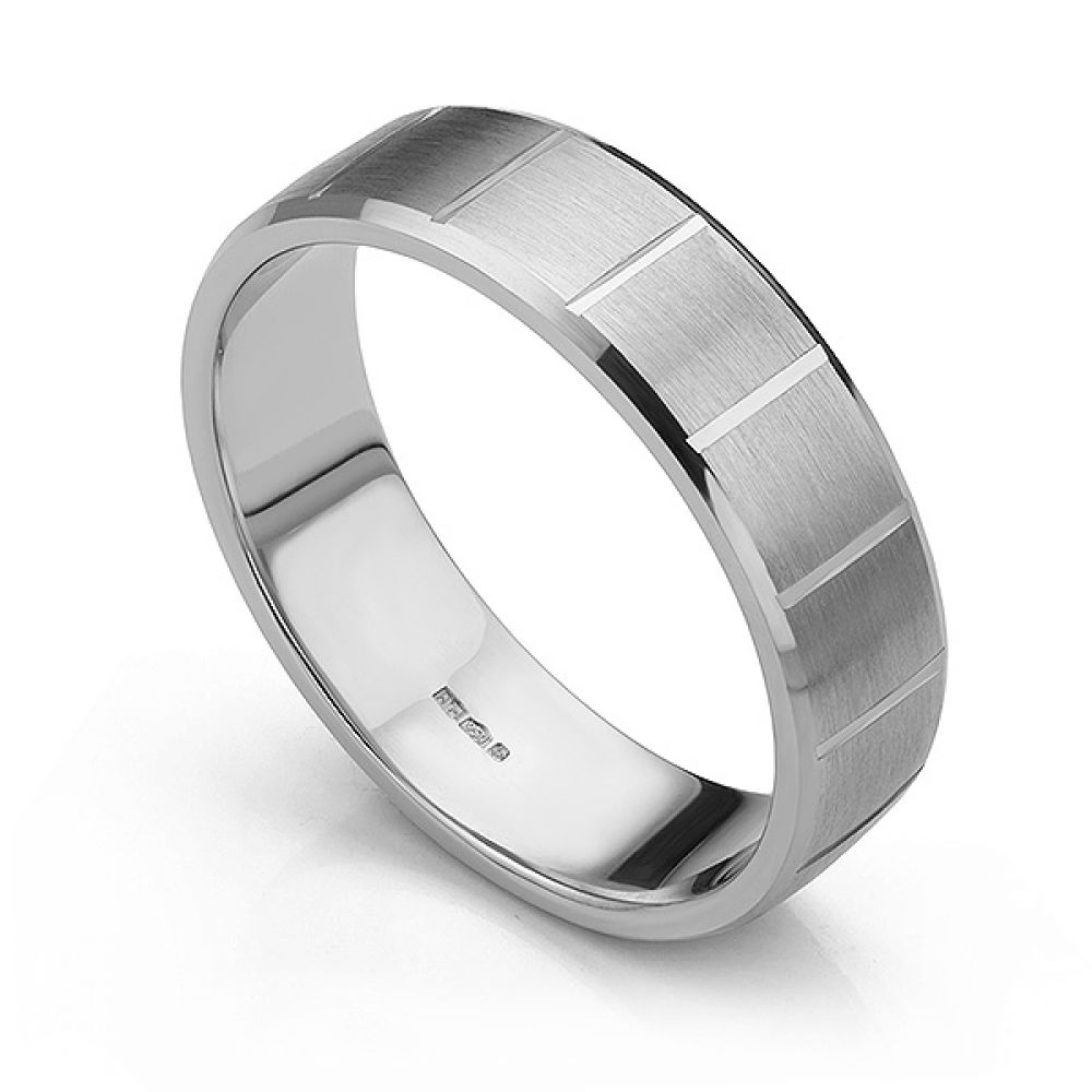 Cross patterned wedding ring with bevelled edge Cross patterned wedding ring with bevelled edge