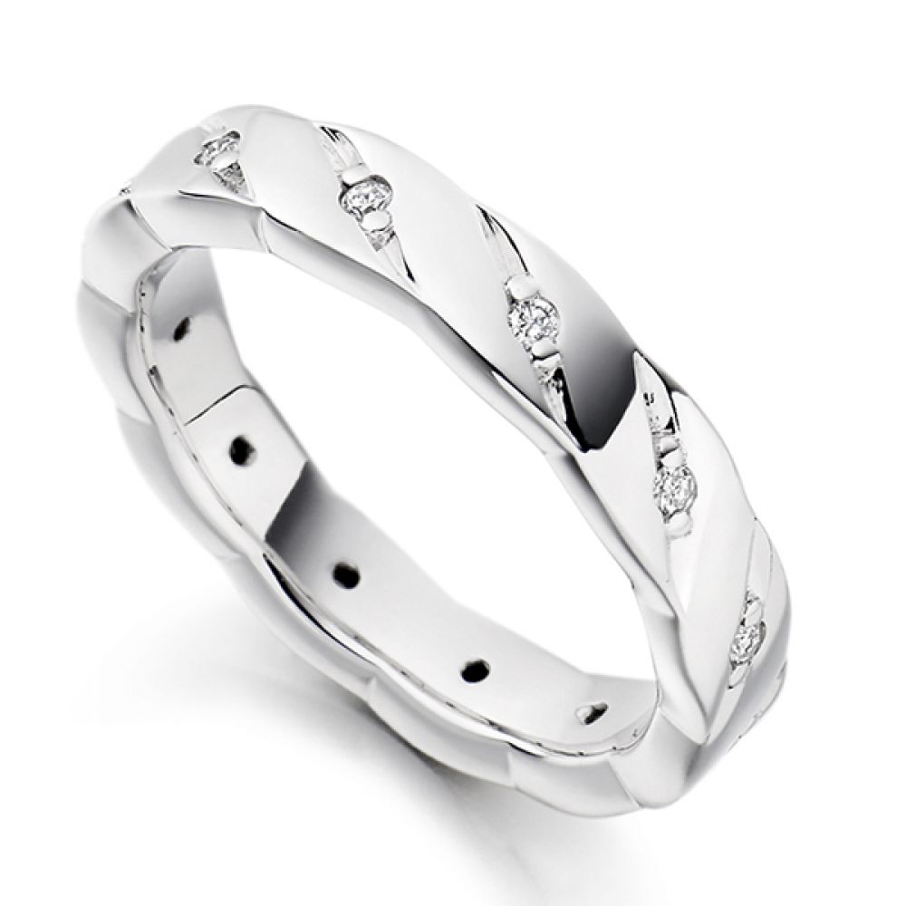 Grain and flush set diamond ring, white gold