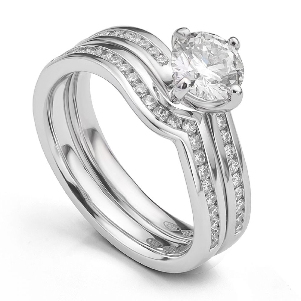 Twizzle twist engagement ring with diamond shoulders ring set