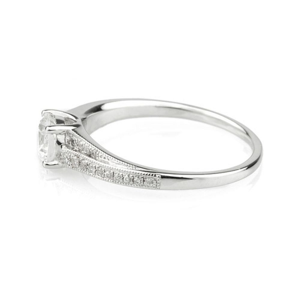 Vintage Diamond Engagement Ring with Stepped Shoulders Side View Vintage Diamond Engagement Ring with Stepped Shoulders Side View