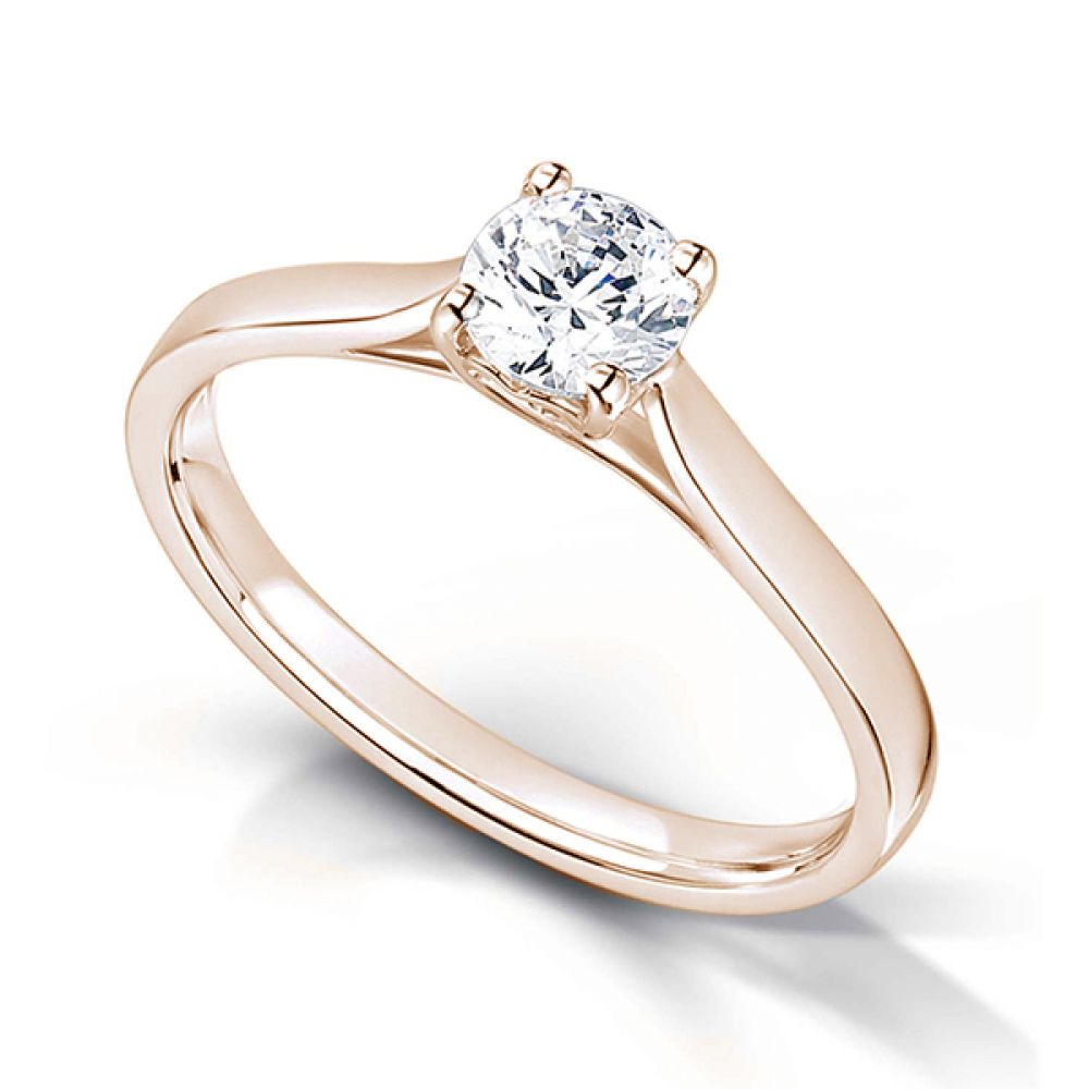 Heart Styled Round Solitaire Engagement Ring In Rose Gold