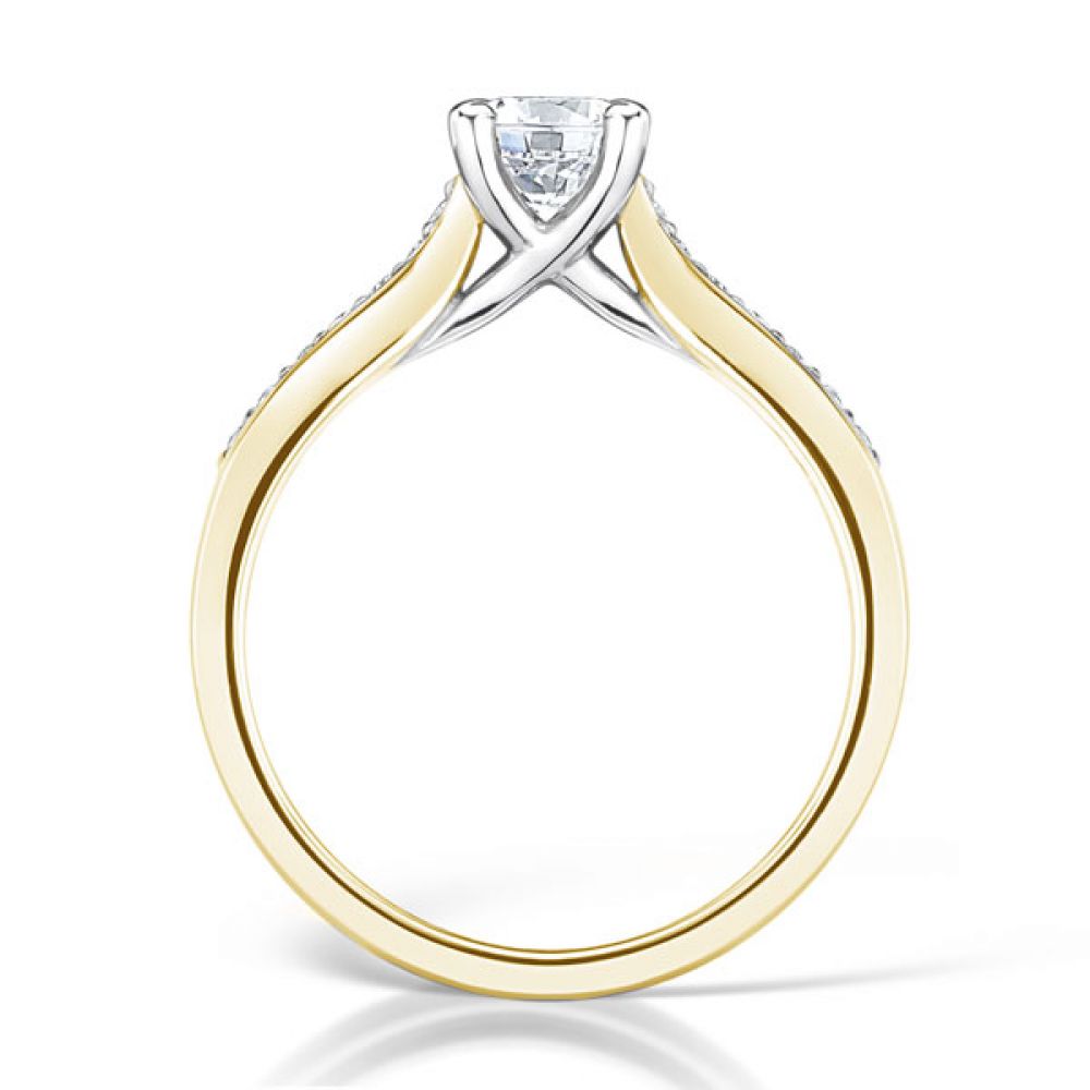 Diamond Shoulder 4 Claw Solitaire Engagement Ring Side View In Yellow Gold Diamond Shoulder 4 Claw Solitaire Engagement Ring Side View In Yellow Gold