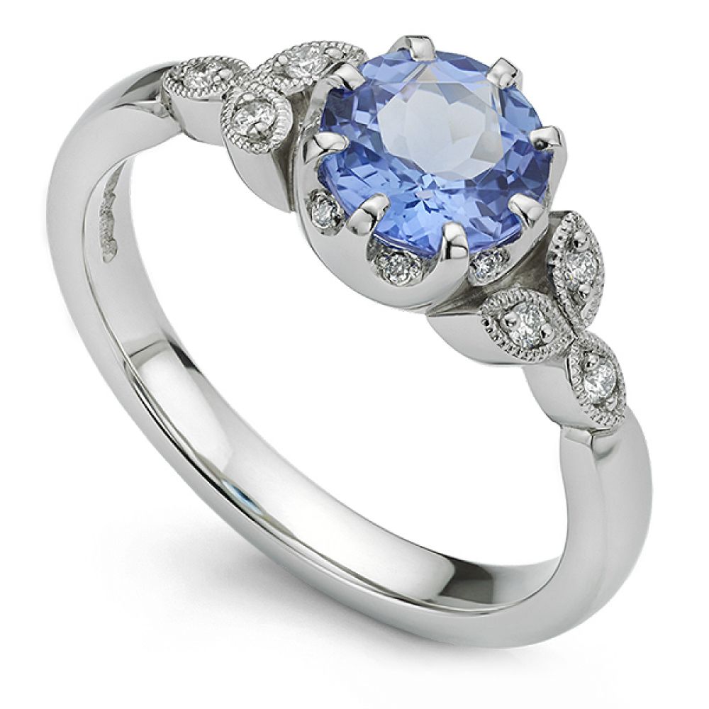 Bespoke Tanzanite Engagement Ring with Diamonds and Vintage style Milgrain set diamond shoulders.