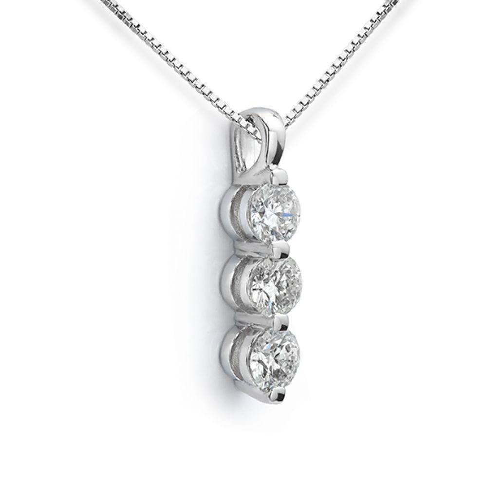 White gold 3 stone diamond necklace side view White gold 3 stone diamond necklace side view