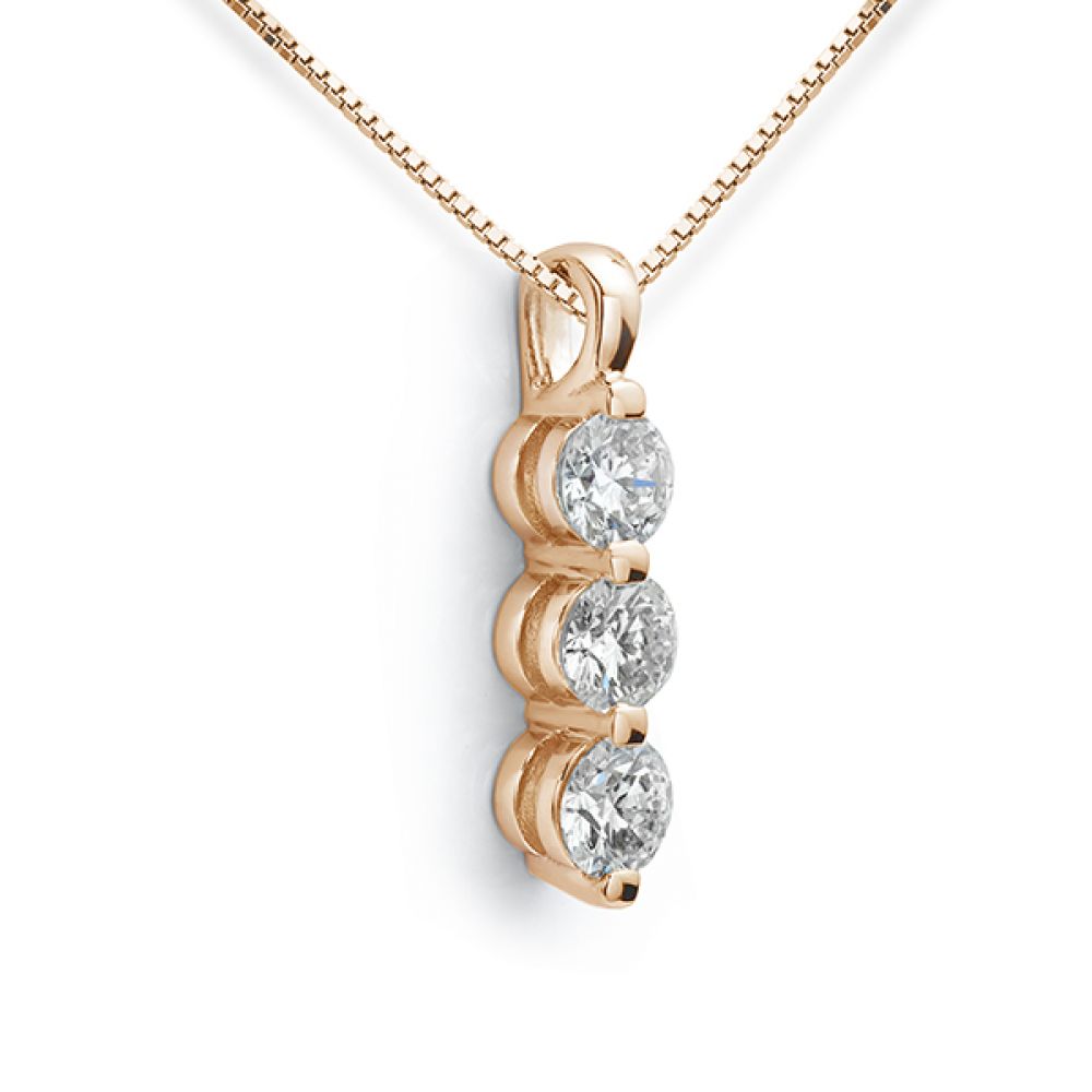 Rose gold 3 stone diamond necklace side view Rose gold 3 stone diamond necklace side view