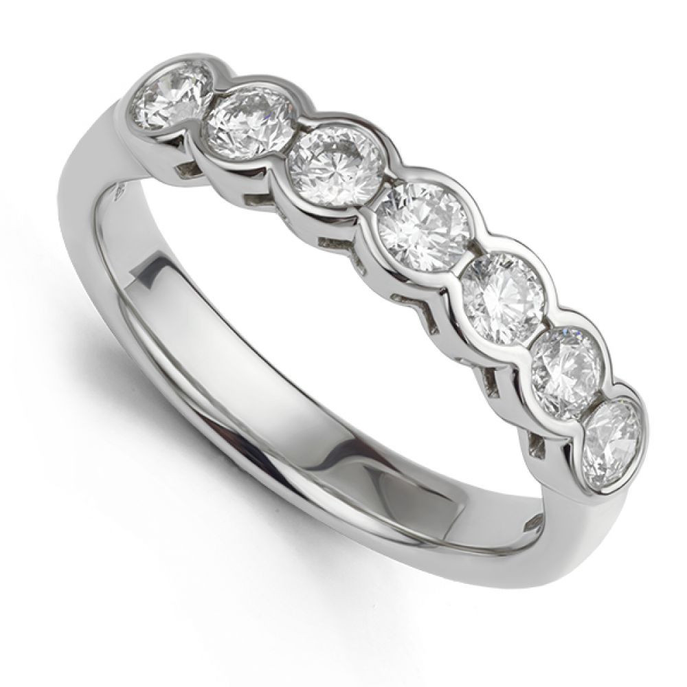 Bezel set half diamond eternity ring in white gold Bezel set half diamond eternity ring in white gold