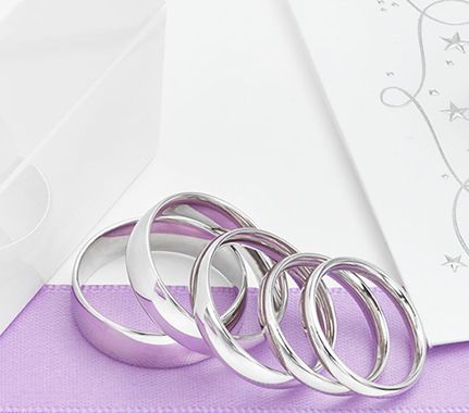 Court shaped plain wedding rings