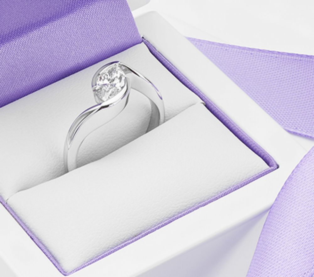 Ursa ring design set with a Marquise cut solitaire