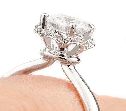 Tulip vintage ring design with a halo of diamonds