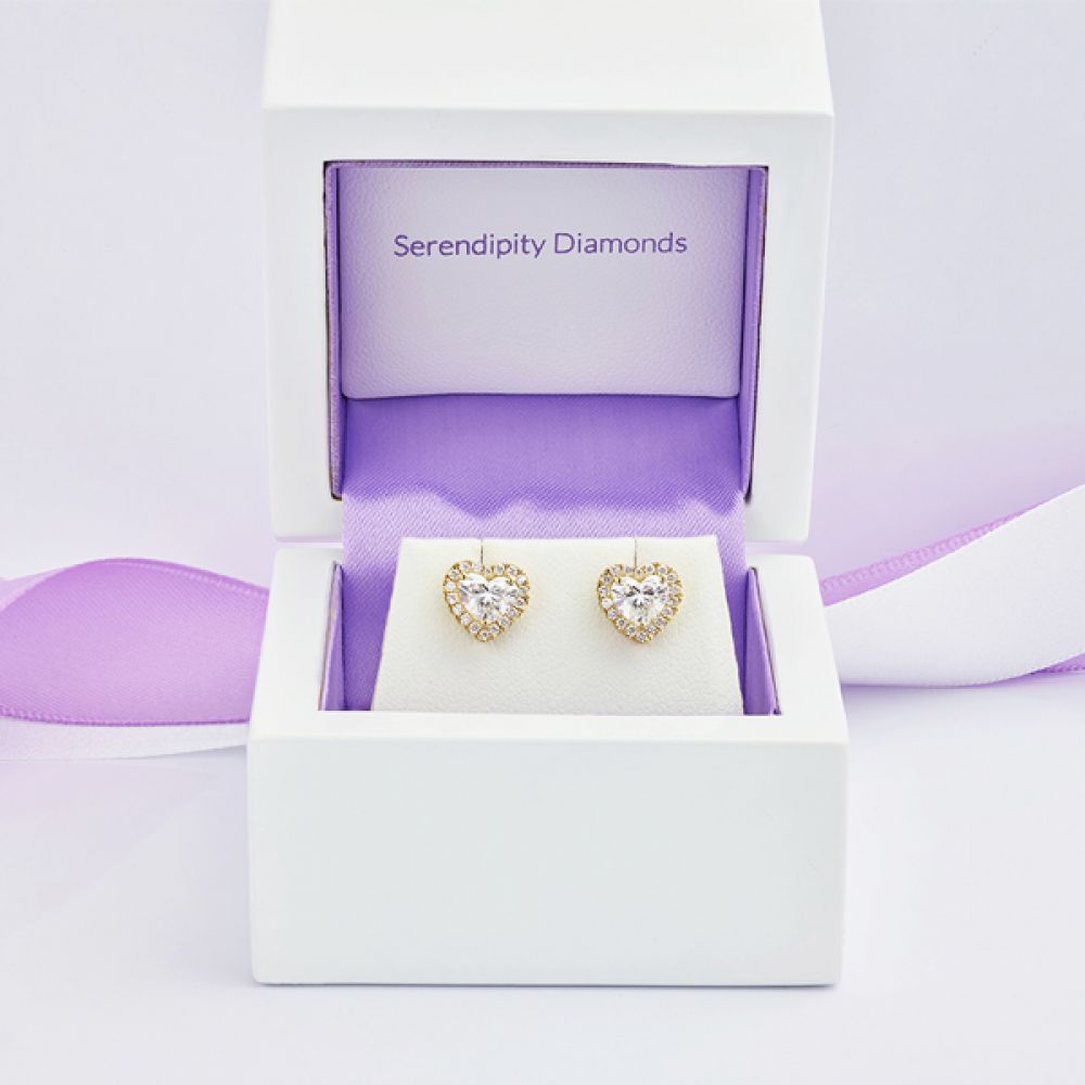 Heart shaped diamond halo earrings in presentation box