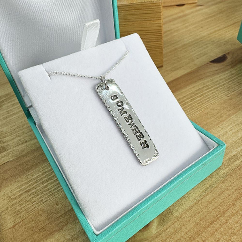 Somewhen necklace shown in box Somewhen necklace shown in box