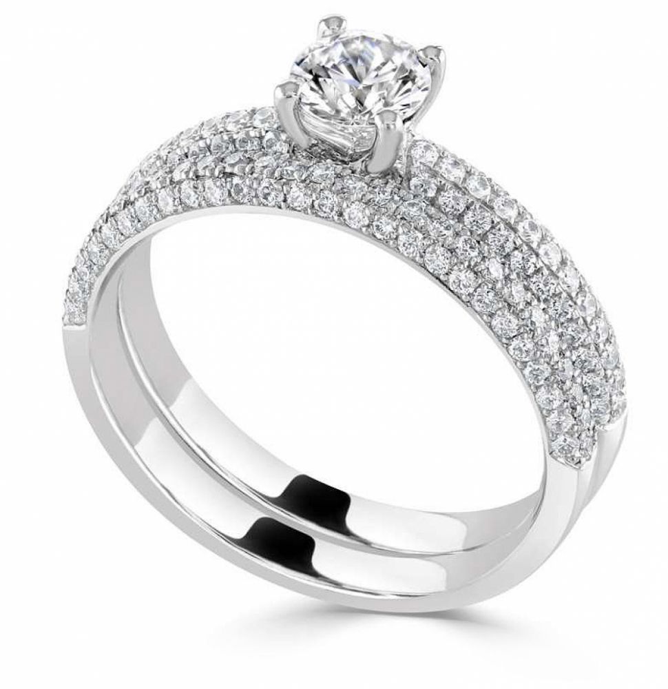 Pavé diamond engagement ring shown with pavé diamond wedding ring Pavé diamond engagement ring shown with pavé diamond wedding ring set