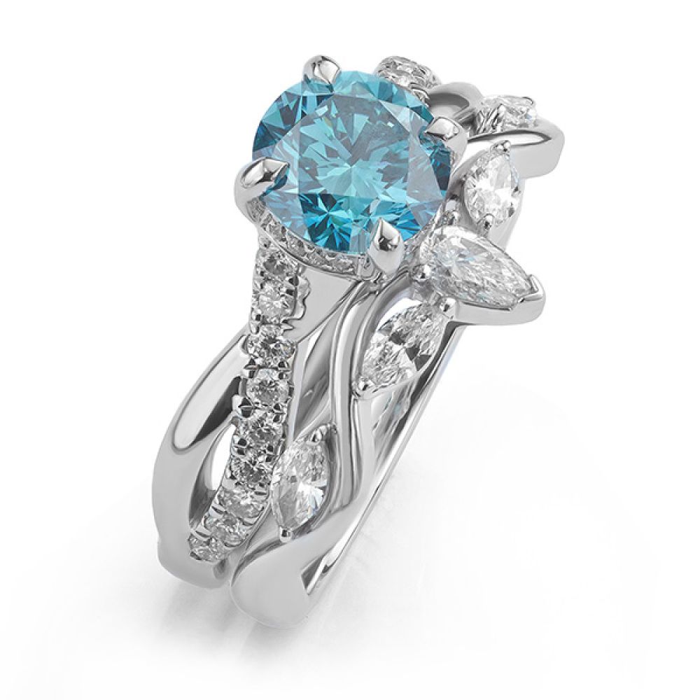 Interwoven tiara style wedding ring alongside blue diamond engagement ring Interwoven tiara style wedding ring alongside blue diamond engagement ring