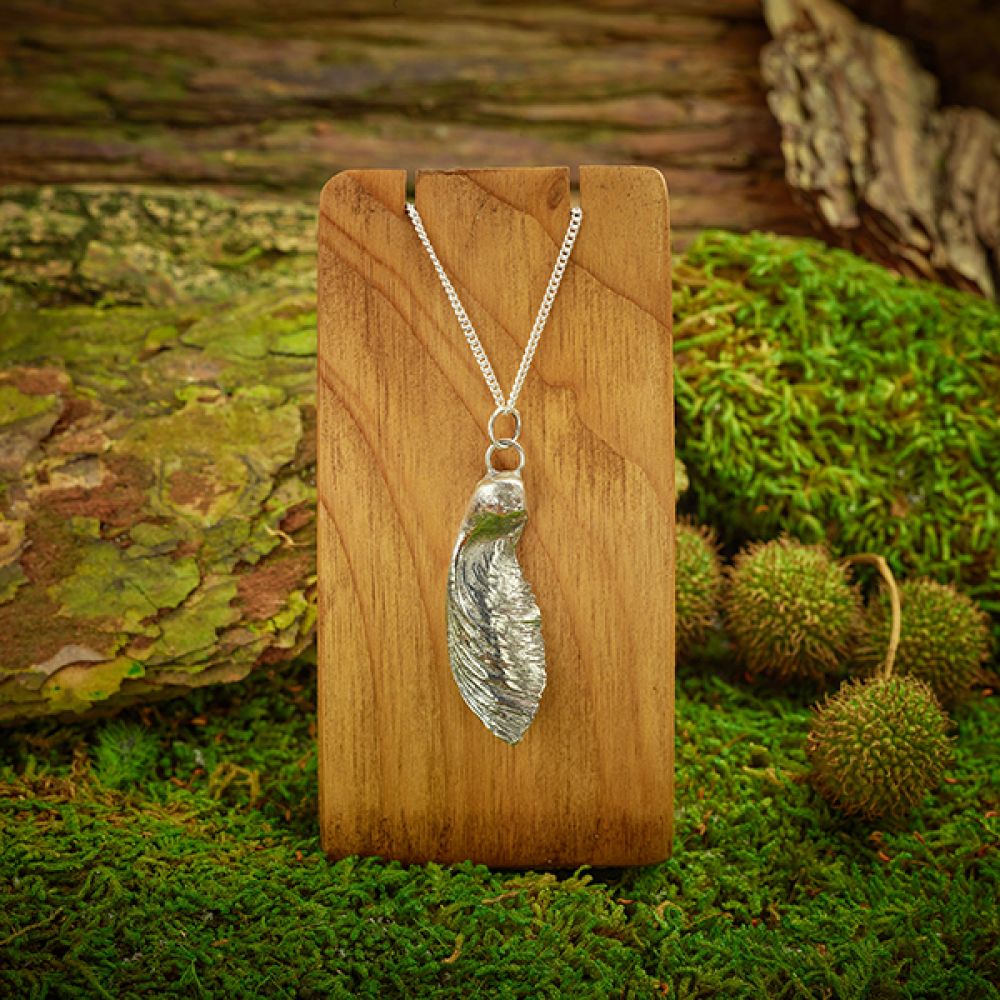 Paper bark maple necklace on Autumnal background Paper bark maple necklace on Autumnal background
