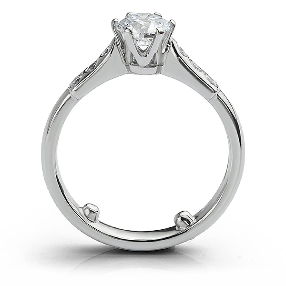 Flush-set diamond shoulder engagement ring with Tiffany style setting