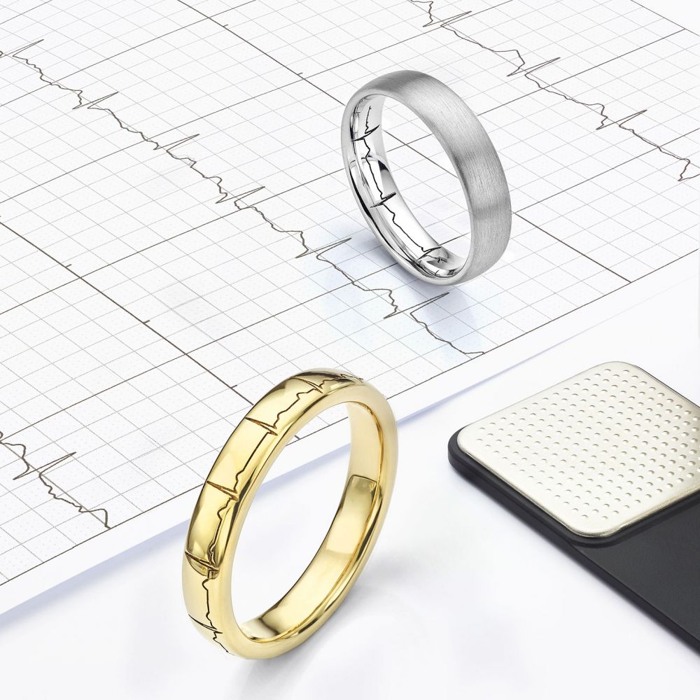 Heartbeat engraved wedding rings