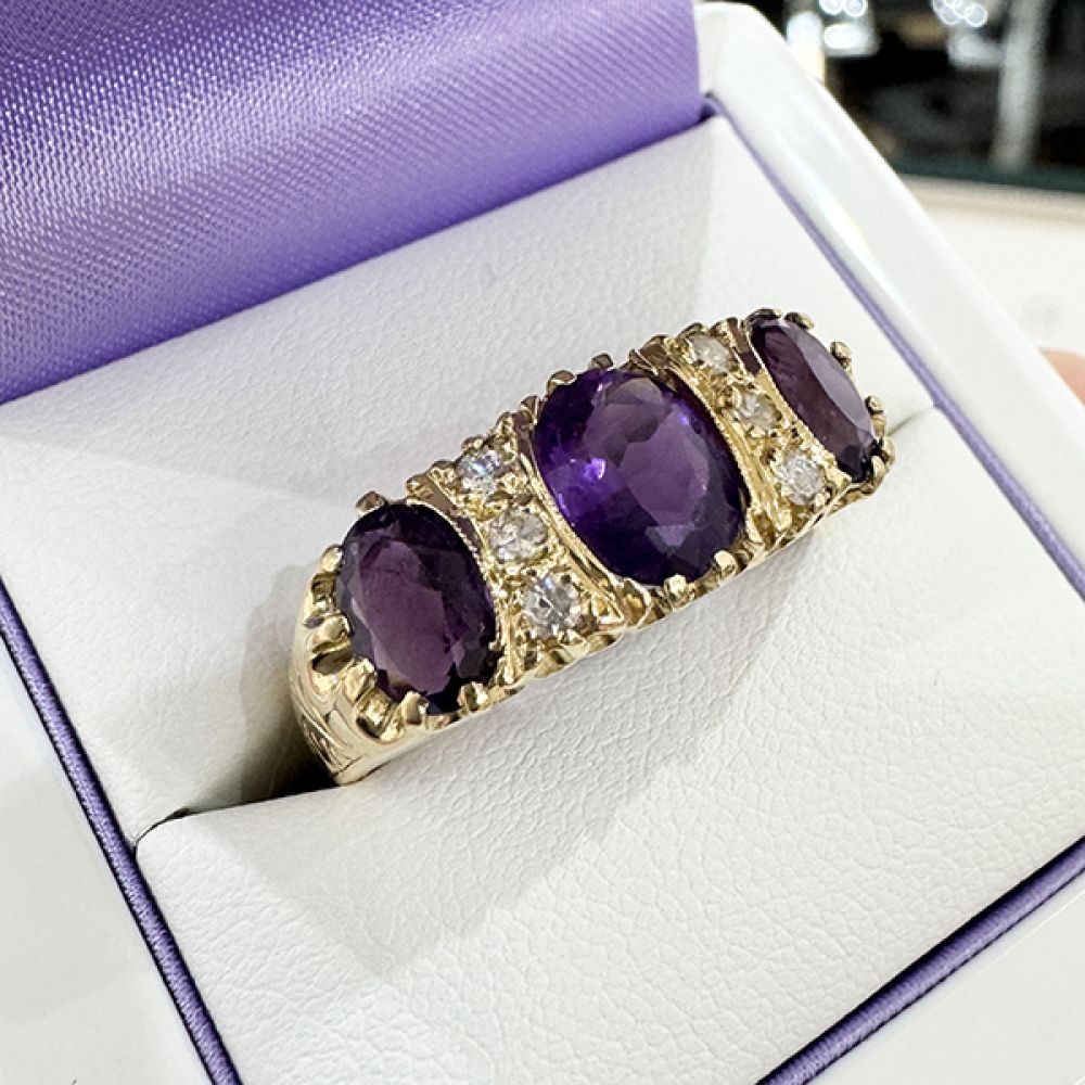 Pre loved amethyst and diamond ring in box