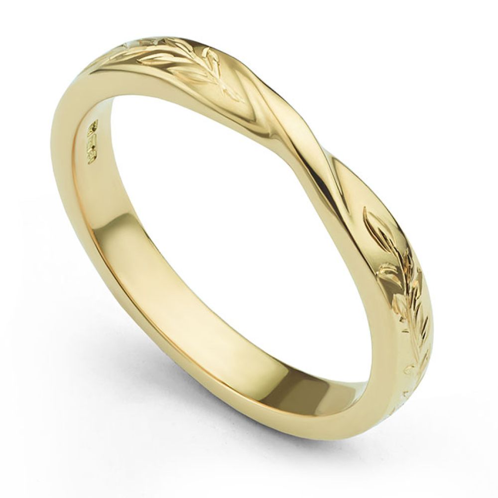Hand engraved ribbon twist wedding ring with floral leaf pattern