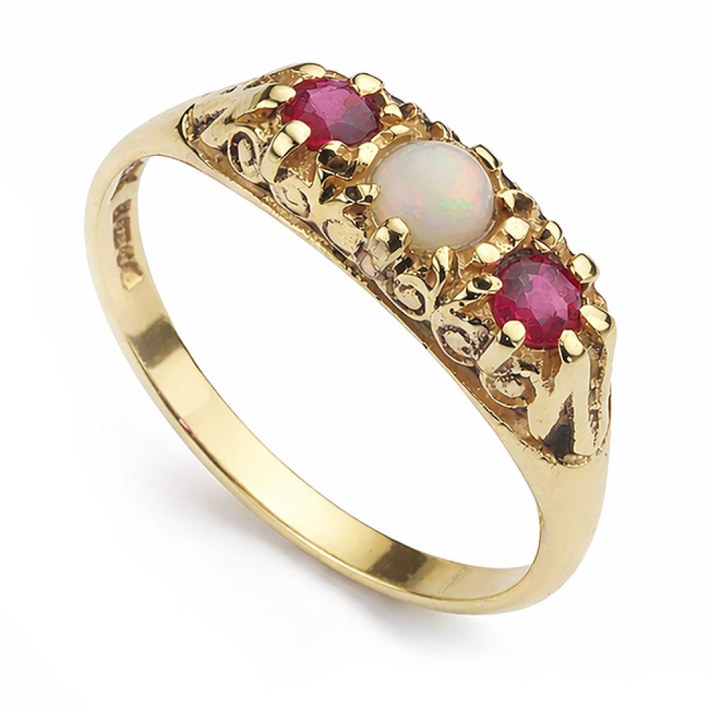 Pre-owned Opal and ruby 3 stone gypsy ring