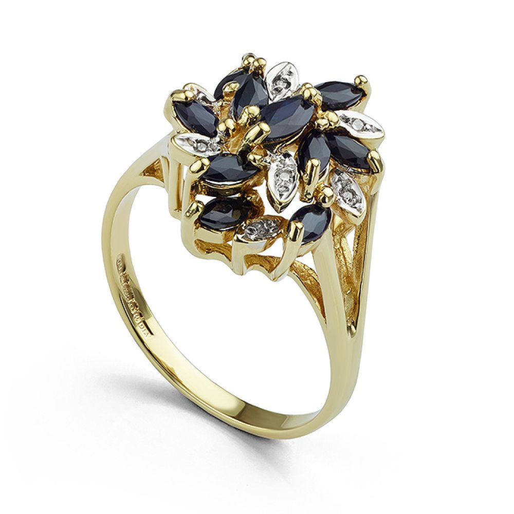 Pre-loved swirl effect blue sapphire and diamond cluster in yellow gold