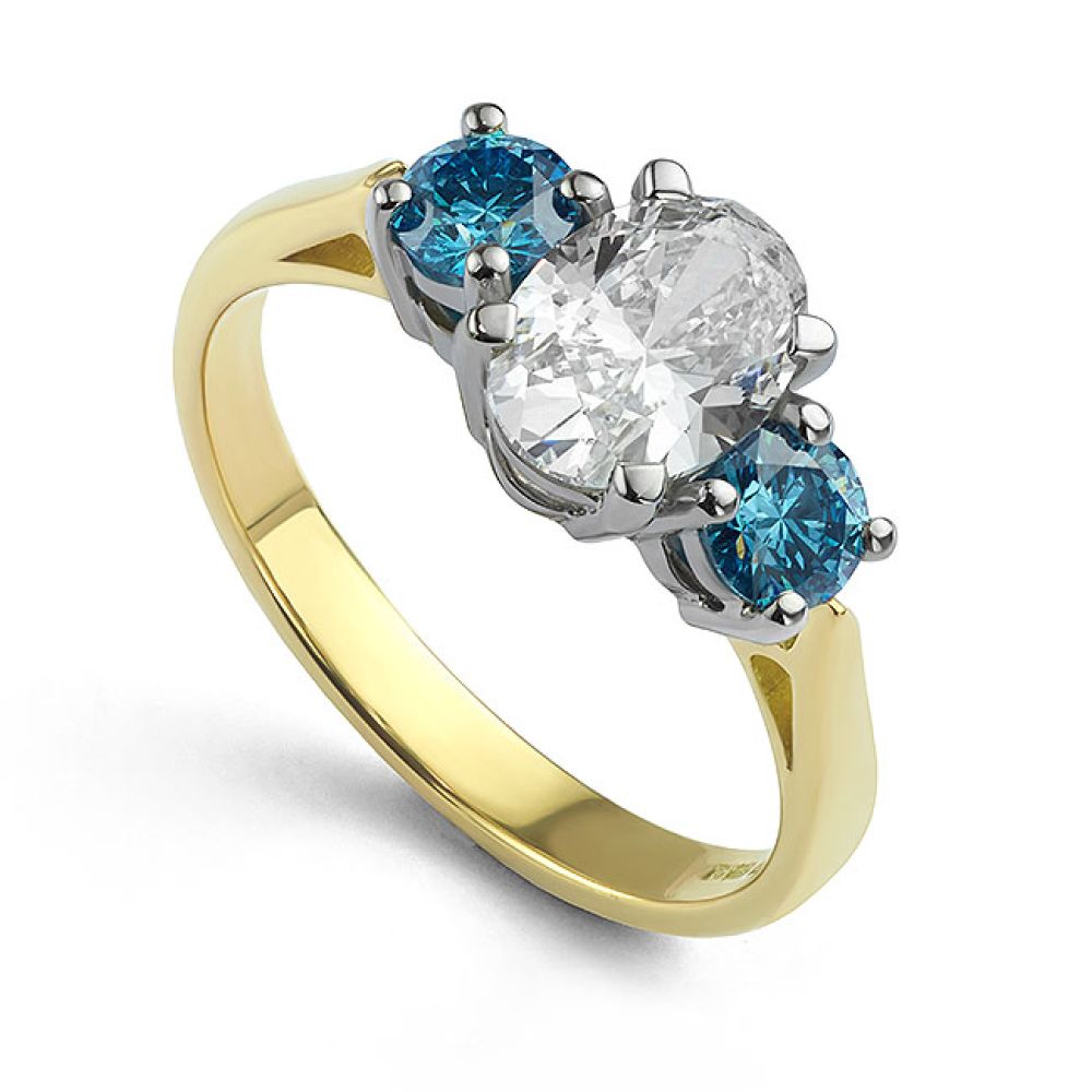 Trilogy Oval and Blue Diamond Engagement Ring