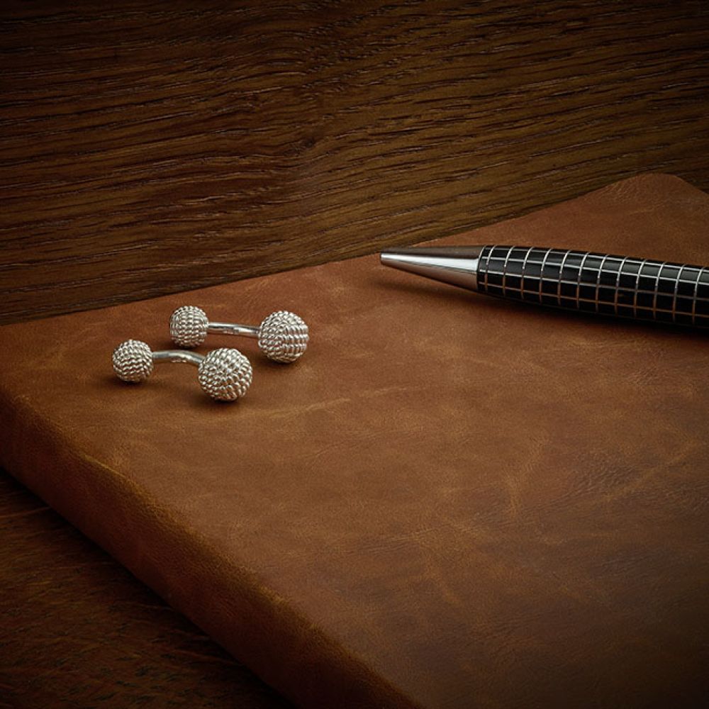 Bespoke Rope Knot Cufflinks on Wood Background