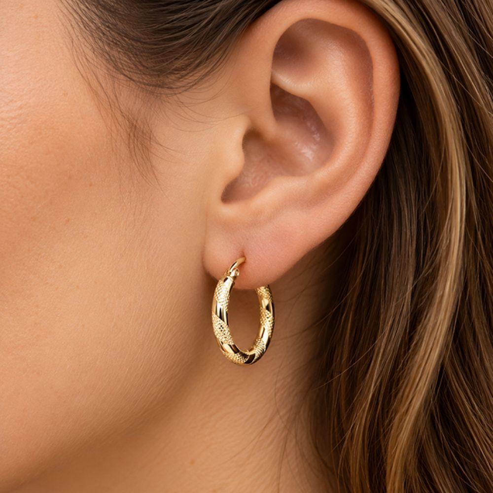 Textured Striped Gold Hoop Earrings 20mm shown in ear