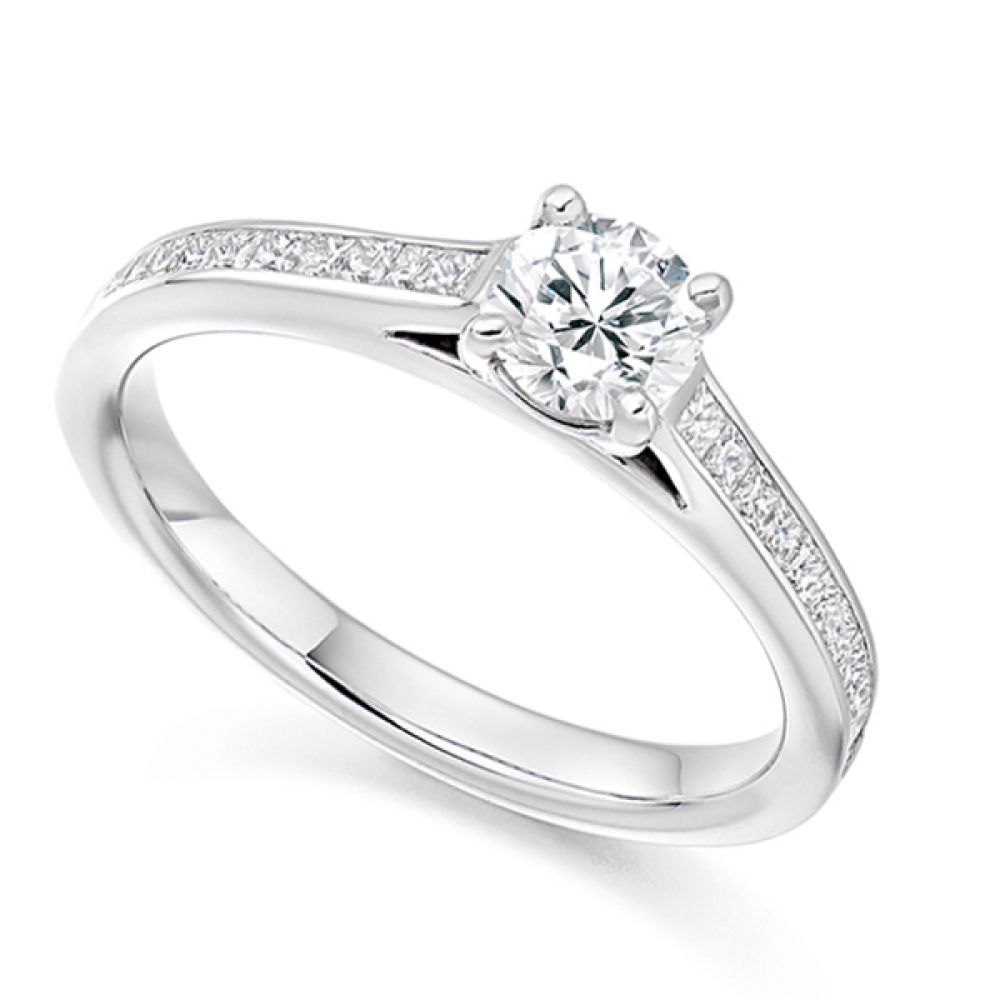 Round Solitaire with Princess Cut Diamond Shoulders