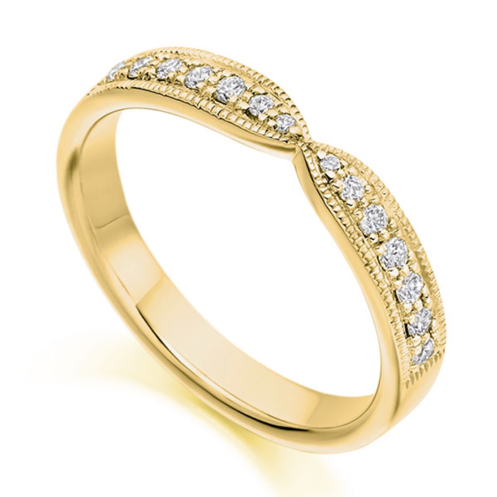 Vintage bowtie, shaped diamond wedding ring in yellow gold Vintage shaped wedding ring with bowtie design and milgrain edge detail shown in yellow gold
