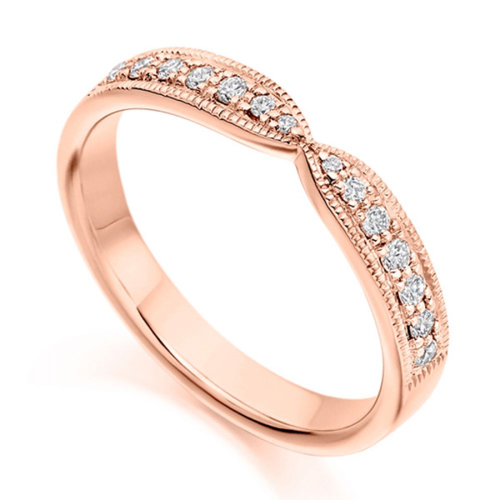 Vintage shaped diamond eternity or wedding ring in rose gold with grain setting and milgrain edge detail