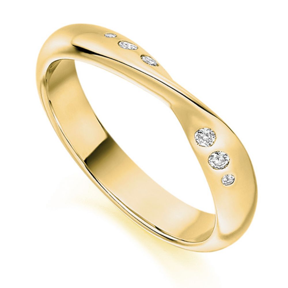 Flush set ribbon twist shaped wedding ring yellow gold