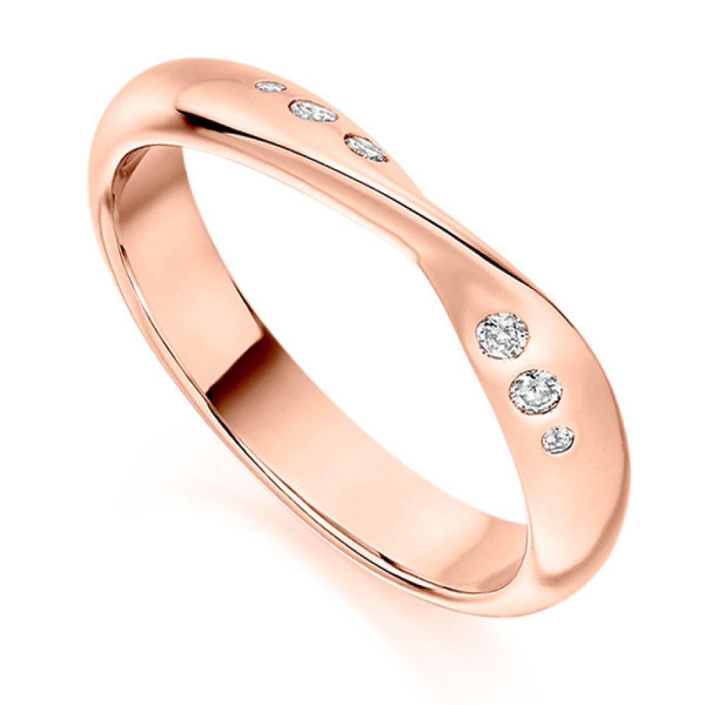 Flush set ribbon twist shaped wedding ring rose gold