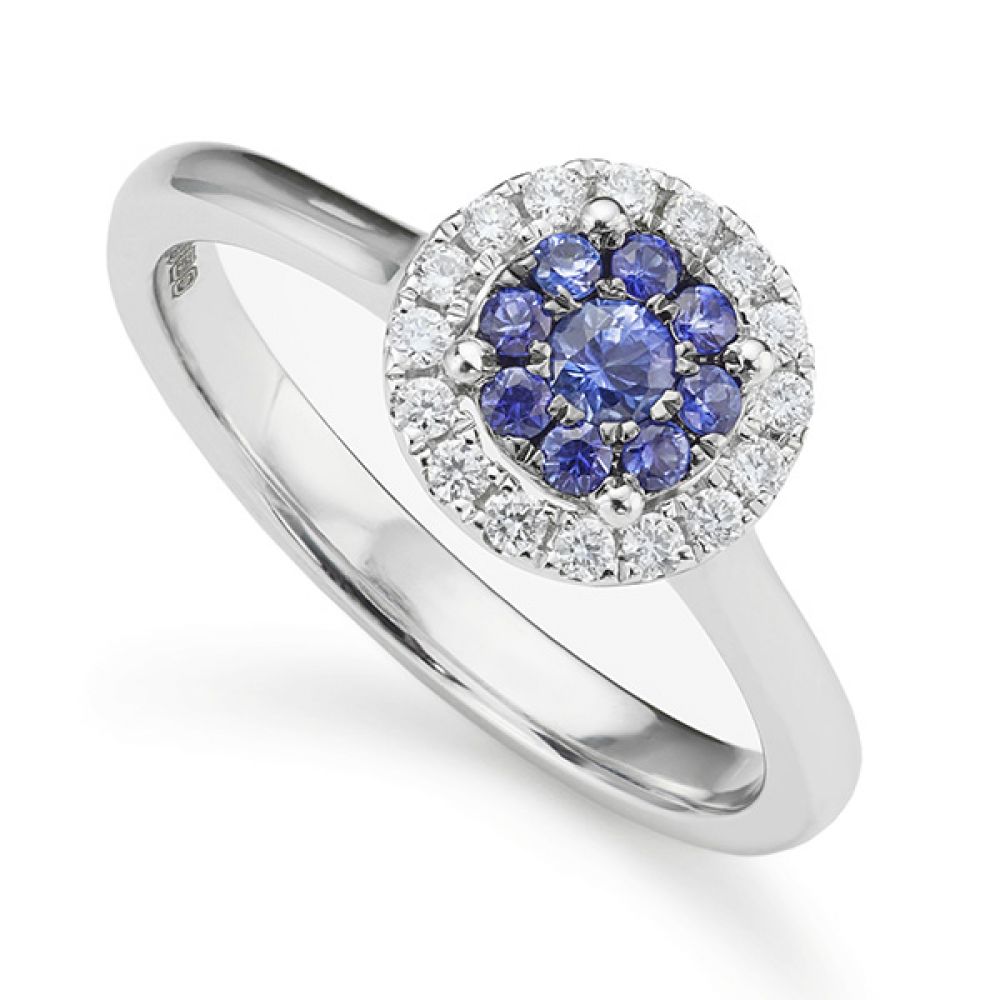 Blue sapphire and diamond halo engagement ring