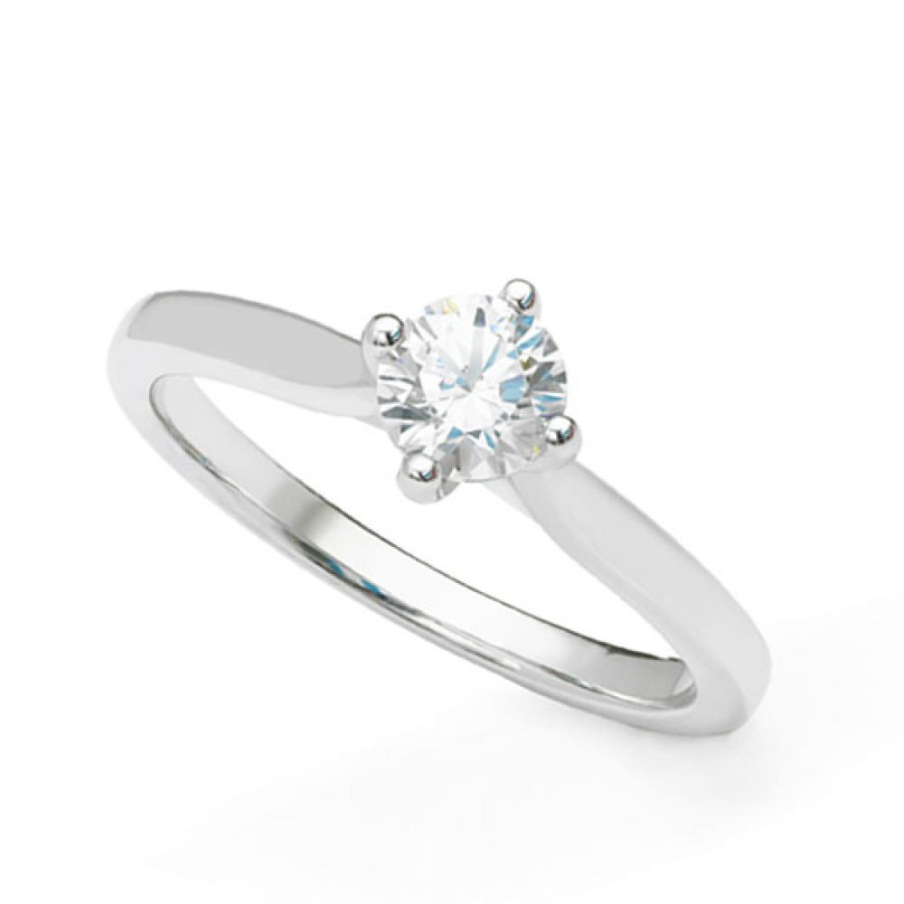 Round solitaire diamond engagement ring with wedding ring friendly setting Round solitaire diamond engagement ring with wedding ring friendly setting