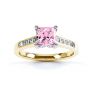 Pink Fliss Princess diamond engagement ring with diamond shoulders yellow gold pink sapphire top view Pink Fliss Princess diamond engagement ring with diamond shoulders yellow gold pink sapphire top view
