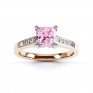 Pink Fliss Princess diamond engagement ring with diamond shoulders rose gold pink sapphire top view Pink Fliss Princess diamond engagement ring with diamond shoulders rose gold pink sapphire top view