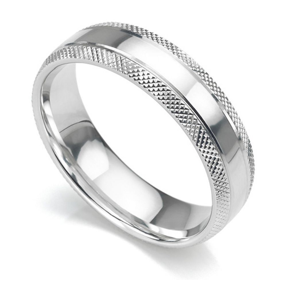 6mm cross hatch patterned wedding ring white gold 6mm court shaped wedding ring with edges cross-hatch patterned either side of a central polished section in white gold