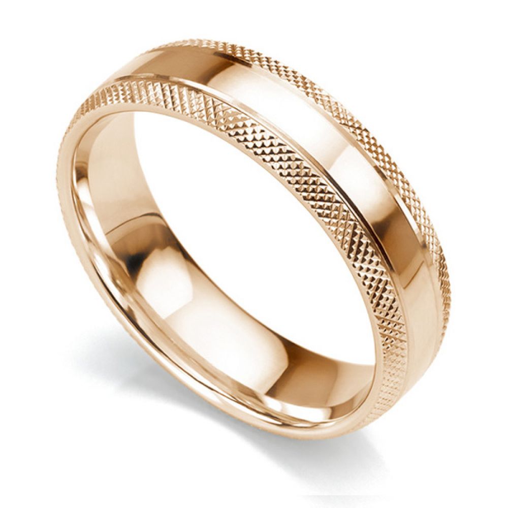 6mm court shaped wedding ring with edges cross-hatch patterned either side of a central polished section in rose gold