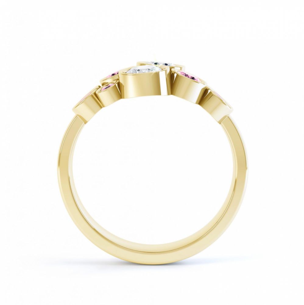 Pink sapphire and diamond bubble ring yellow gold side view Pink sapphire and diamond bubble ring yellow gold side view