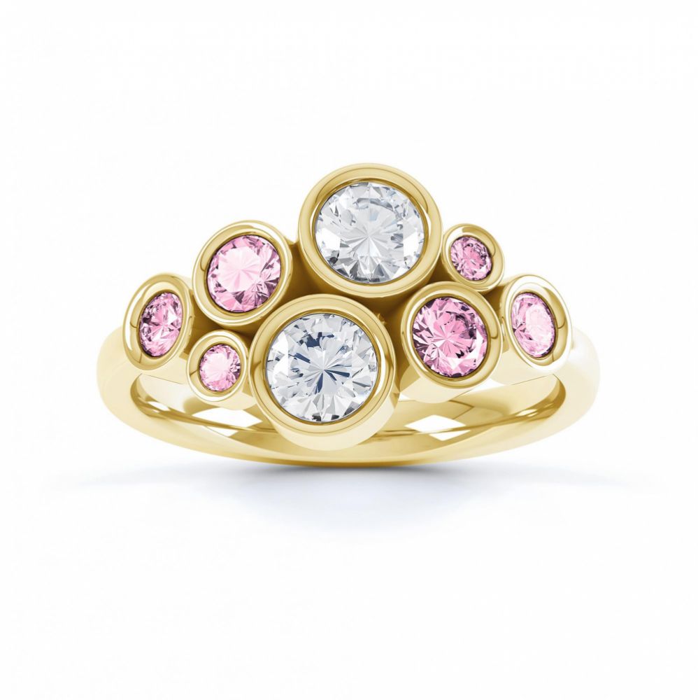 Pink sapphire and diamond bubble ring yellow gold top view Pink sapphire and diamond bubble ring yellow gold top view