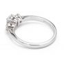 Oval and round diamond three stone ring side view white gold Oval and round diamond three stone ring side view white gold