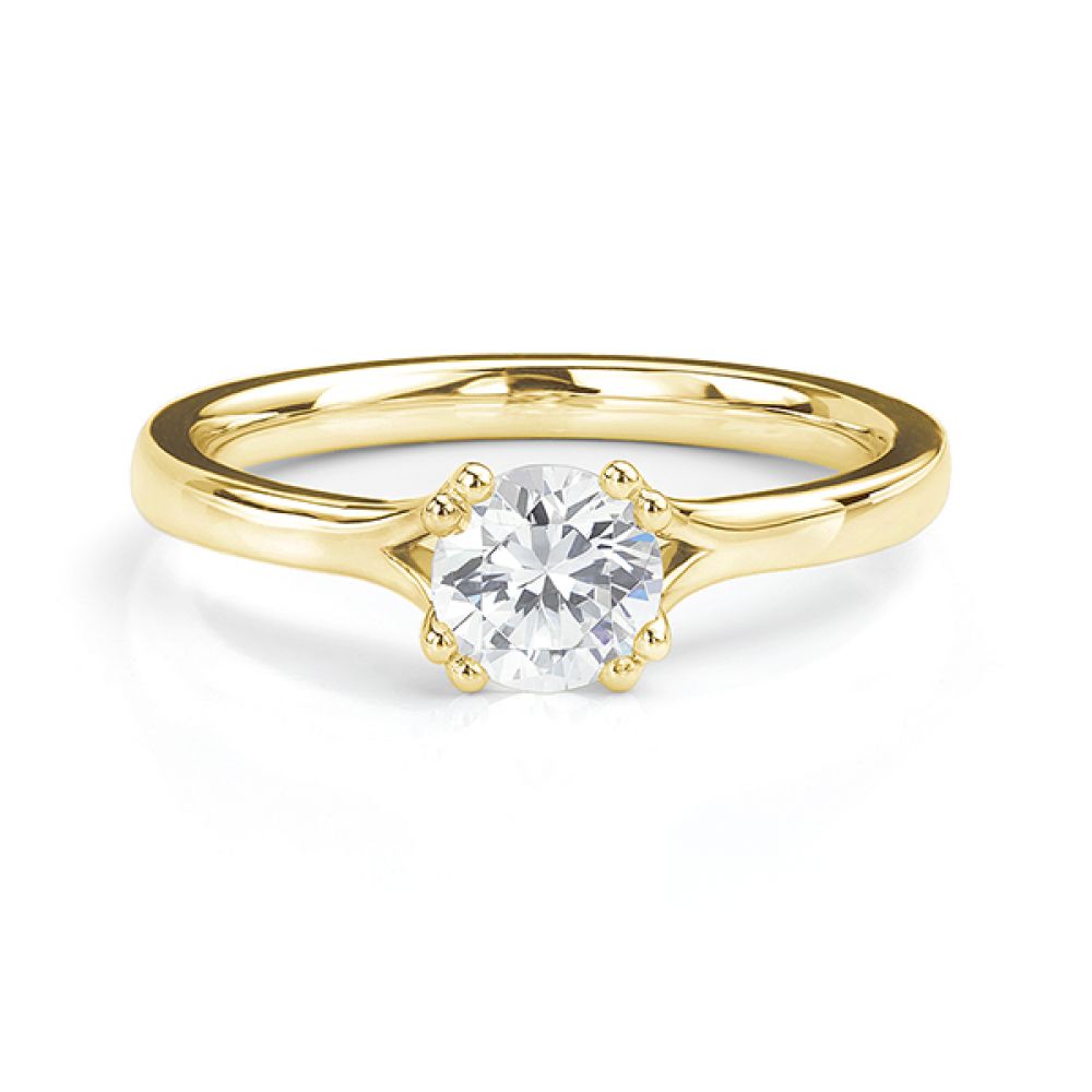 Yellow gold double claw engagement ring front view